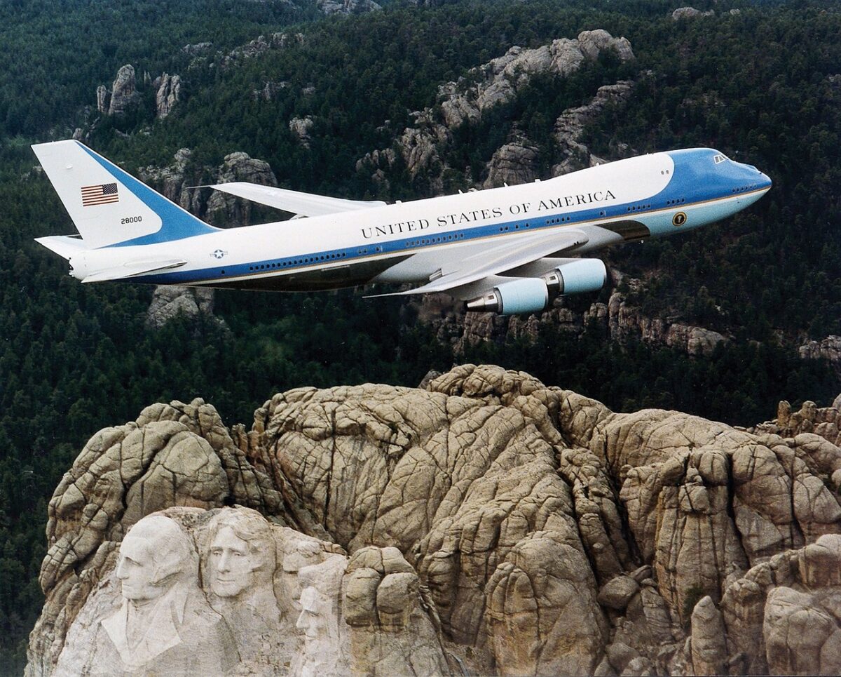 plane over mount rushmore